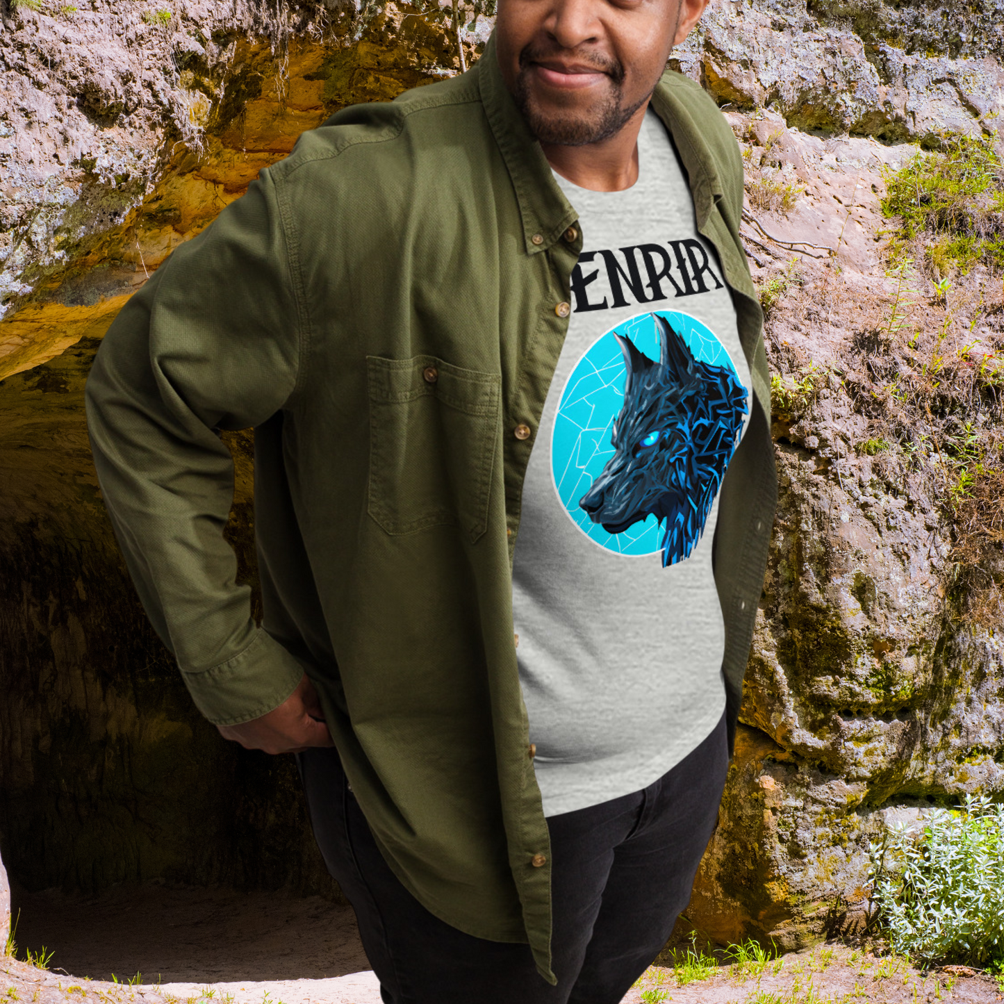 Viking Shirt, Fenrir Shirt, Wolf Shirt, Mythology Gift, Viking Gift, athletic men's t-shirt, side view in a jacket, Fenrir in blue with glowing eyes. Mythical Accessories Emporium