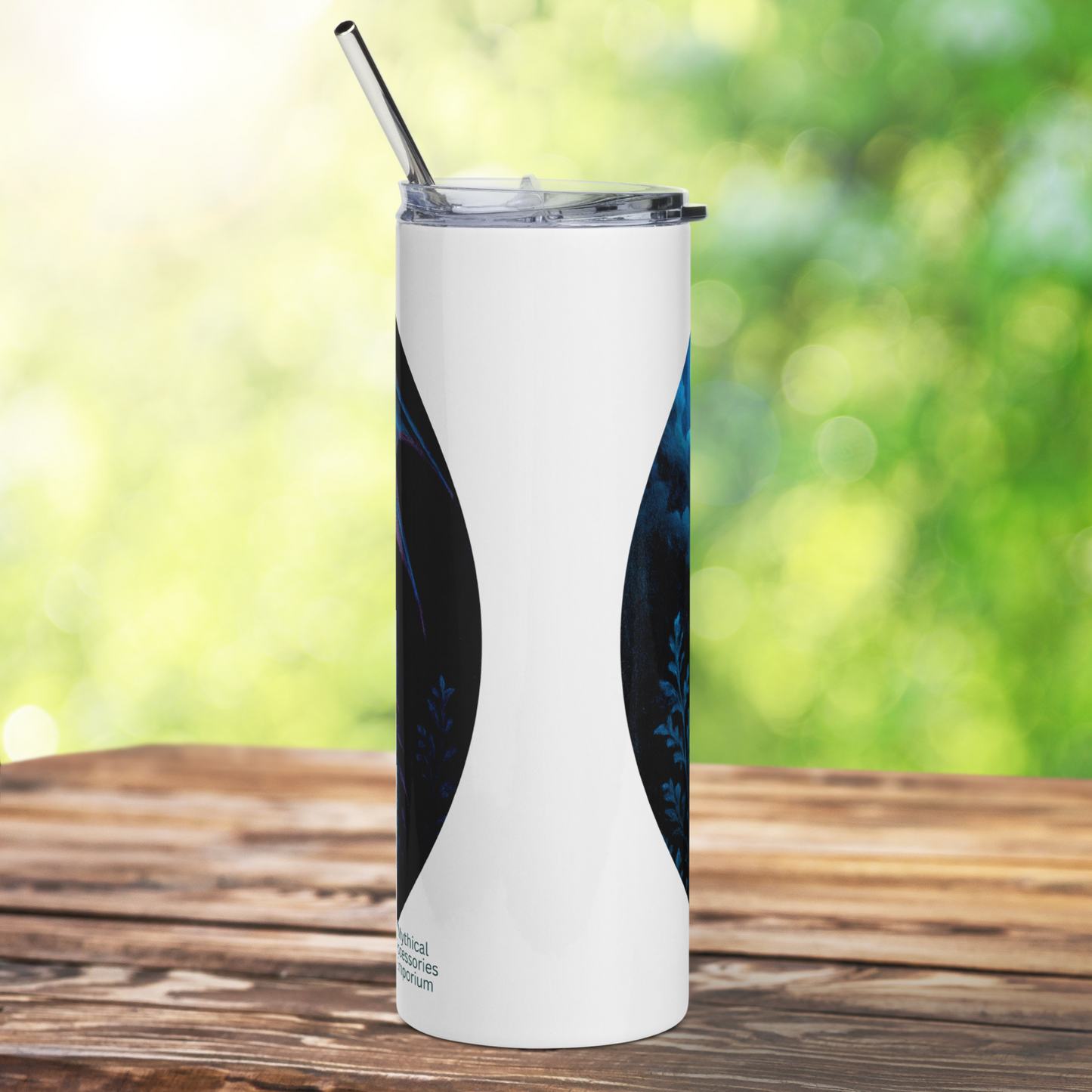 Insulated stainless steel fantasy dragon tumbler. This is a back view of a white tumbler with a dragon graphic. You can see the stainless steel straw sticking up from the tumbler. The graphic is on a white tumbler.