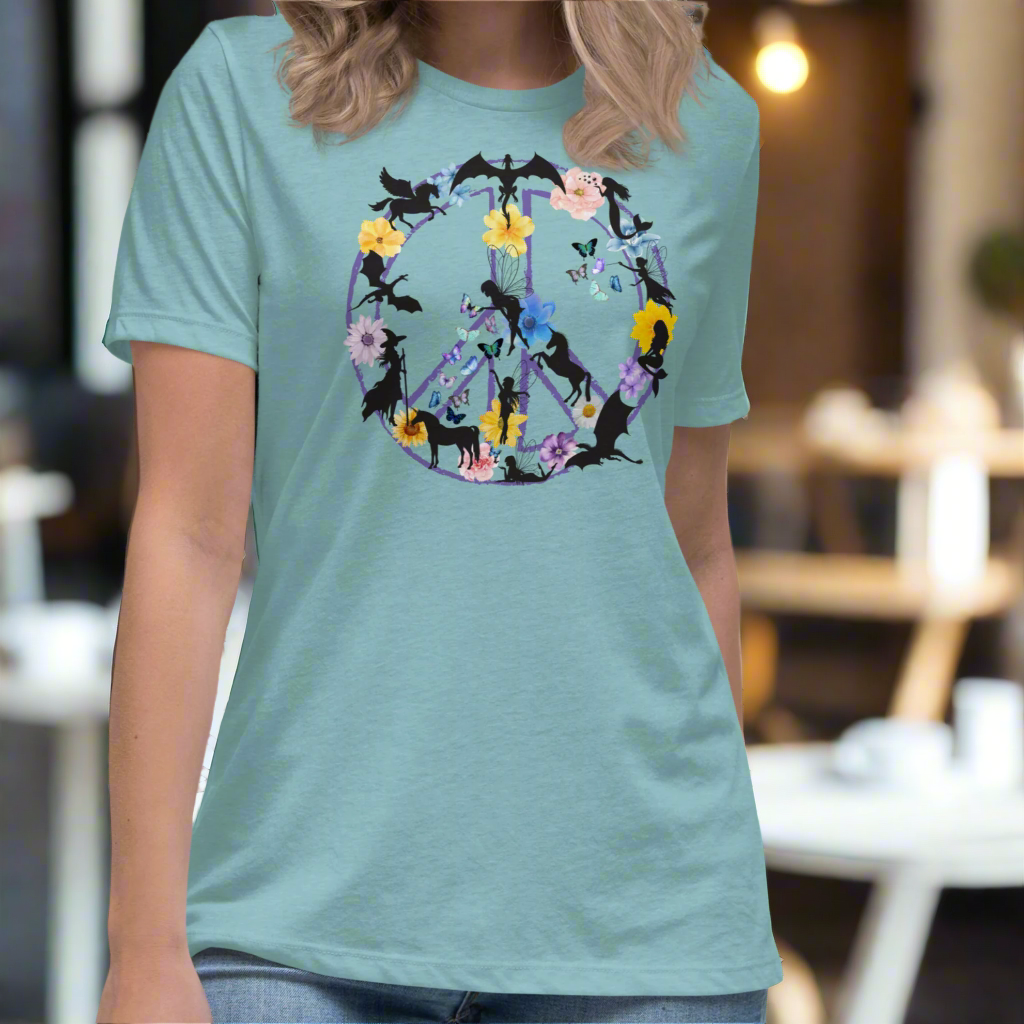70s Vintage Peace Sign Women's heather blue lagoon T-Shirt Front View. Purple Peace sign filled in with dragons, mermaids, fairies, unicorns, pegasi, witches, flowers, and butterflies.