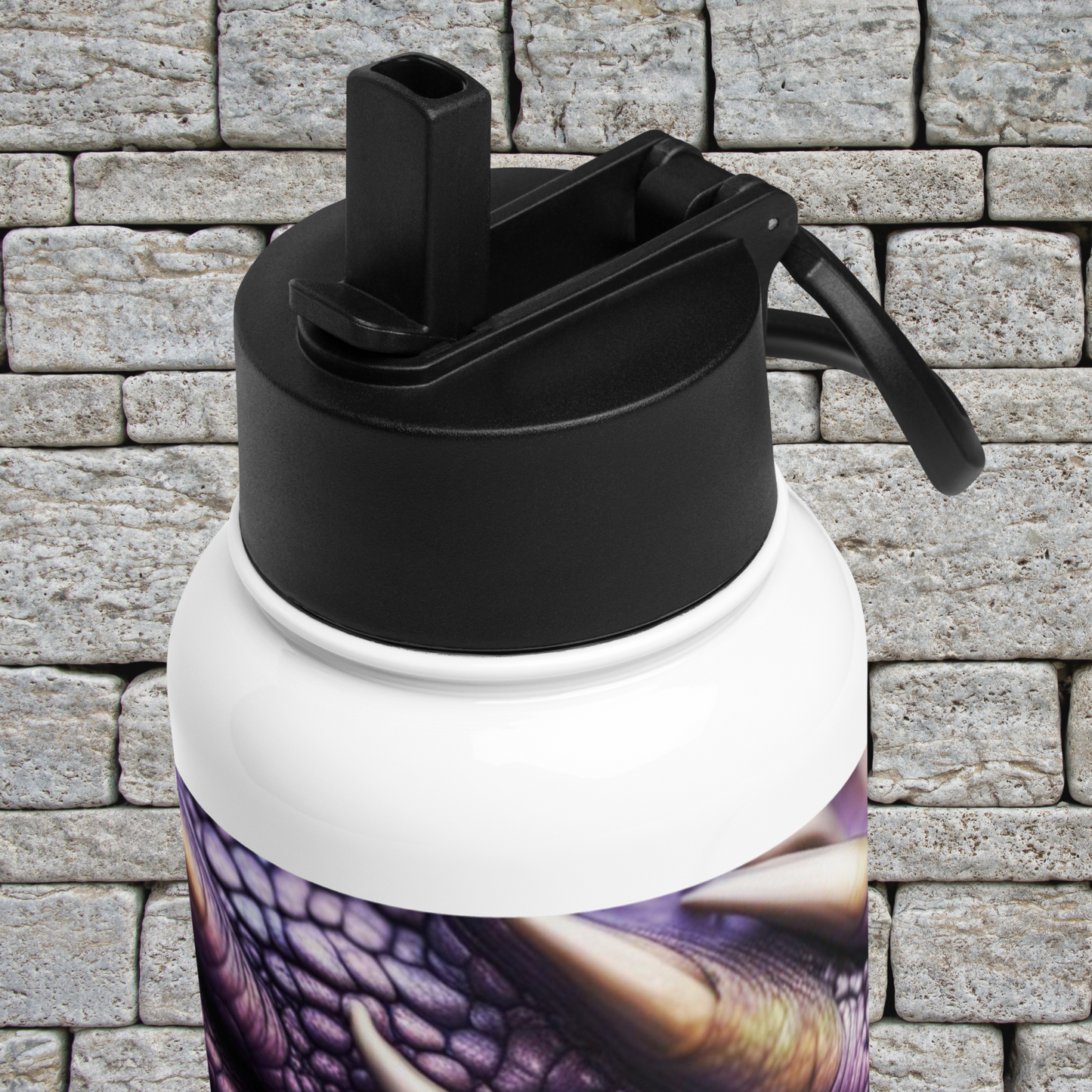 View of the top of the black lid of the stainless steel water bottle. You can see the flip up straw is up and where it would fit into the lid.
