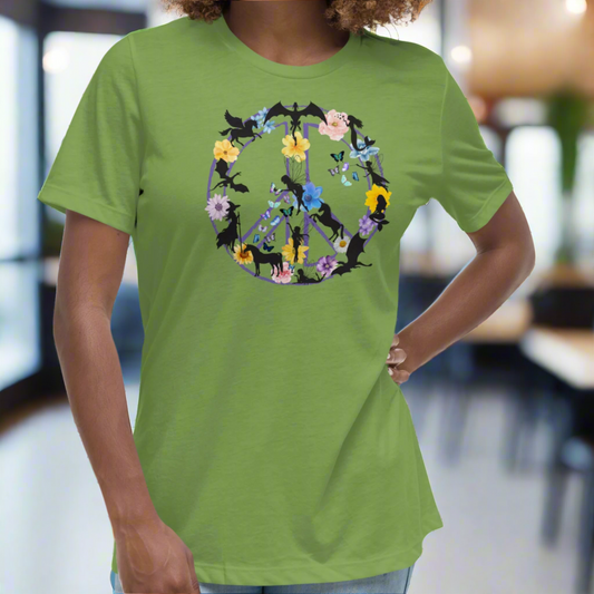 70s Vintage Peace Sign Women's Leaf (green) T-Shirt Front View. Purple Peace sign filled in with dragons, mermaids, fairies, unicorns, pegasi, witches, flowers, and butterflies.