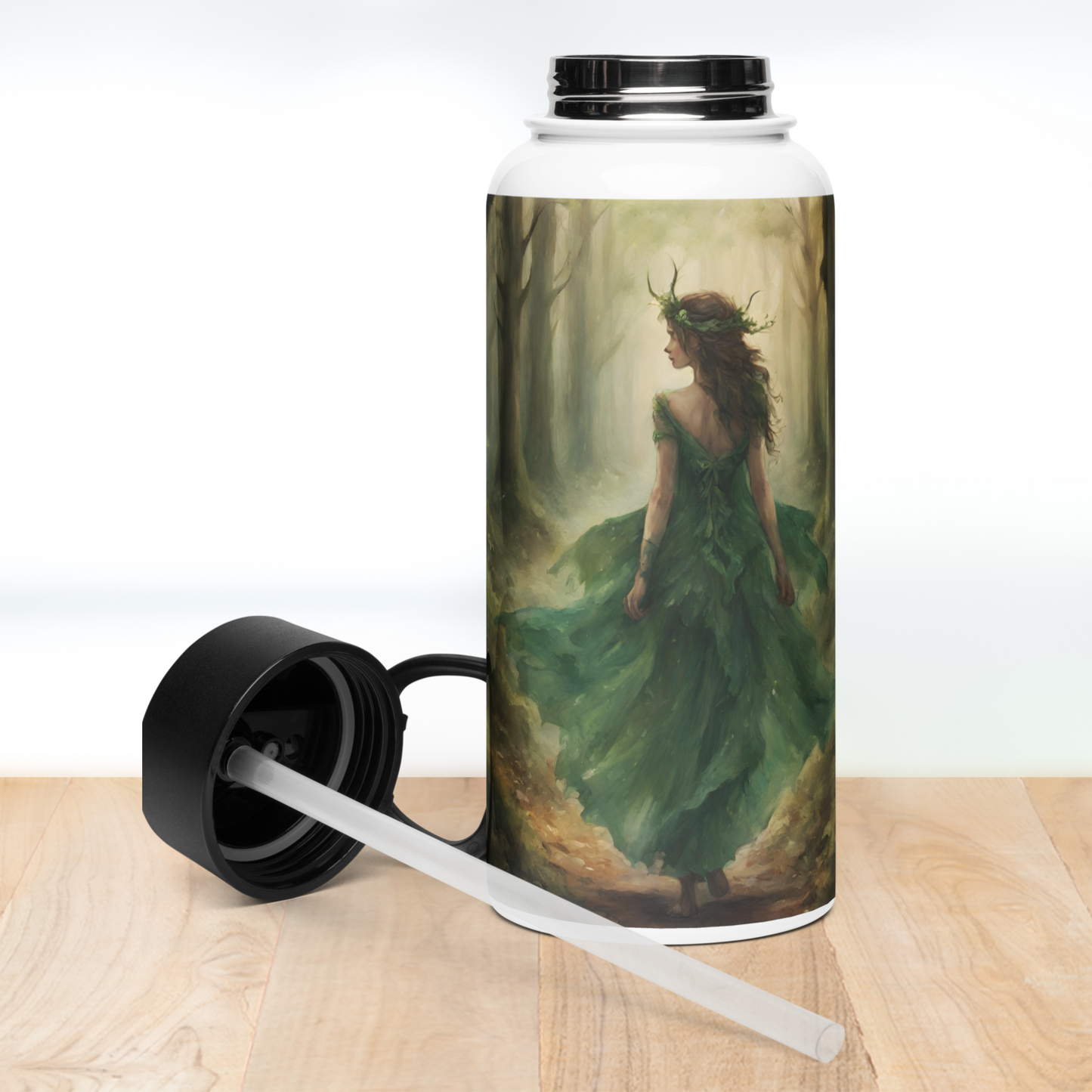 Front view of stainless steel bottle with black lid off sitting next to the bottle on the table. You can see the clear plastic straw connected to the bottom of the lid.