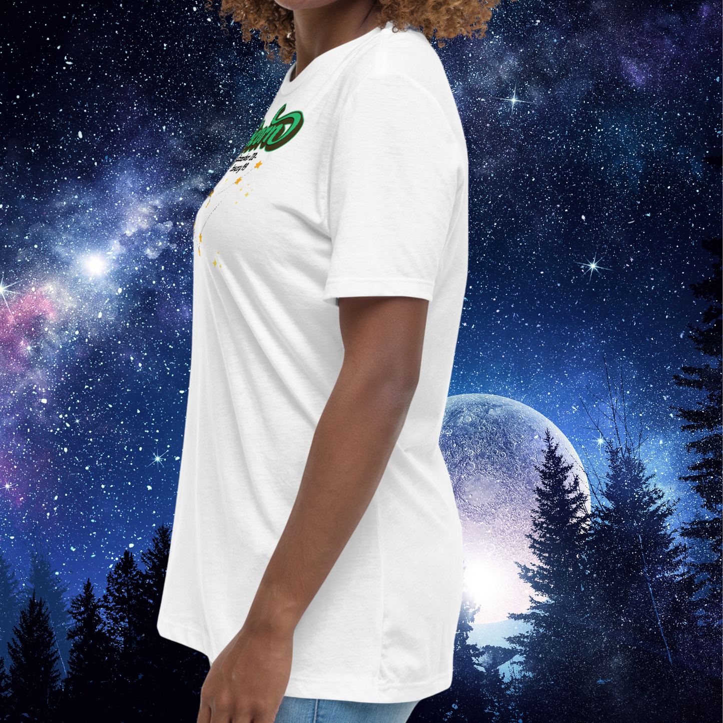 Left side view of model wearing white women's Capricorn Tee. This astrology T-Shirt shows the side seam the short sleeves that end mid upper arm and the hem that falls below the model's hips. The perfect December or January Birthday Gift for Her or yourself.