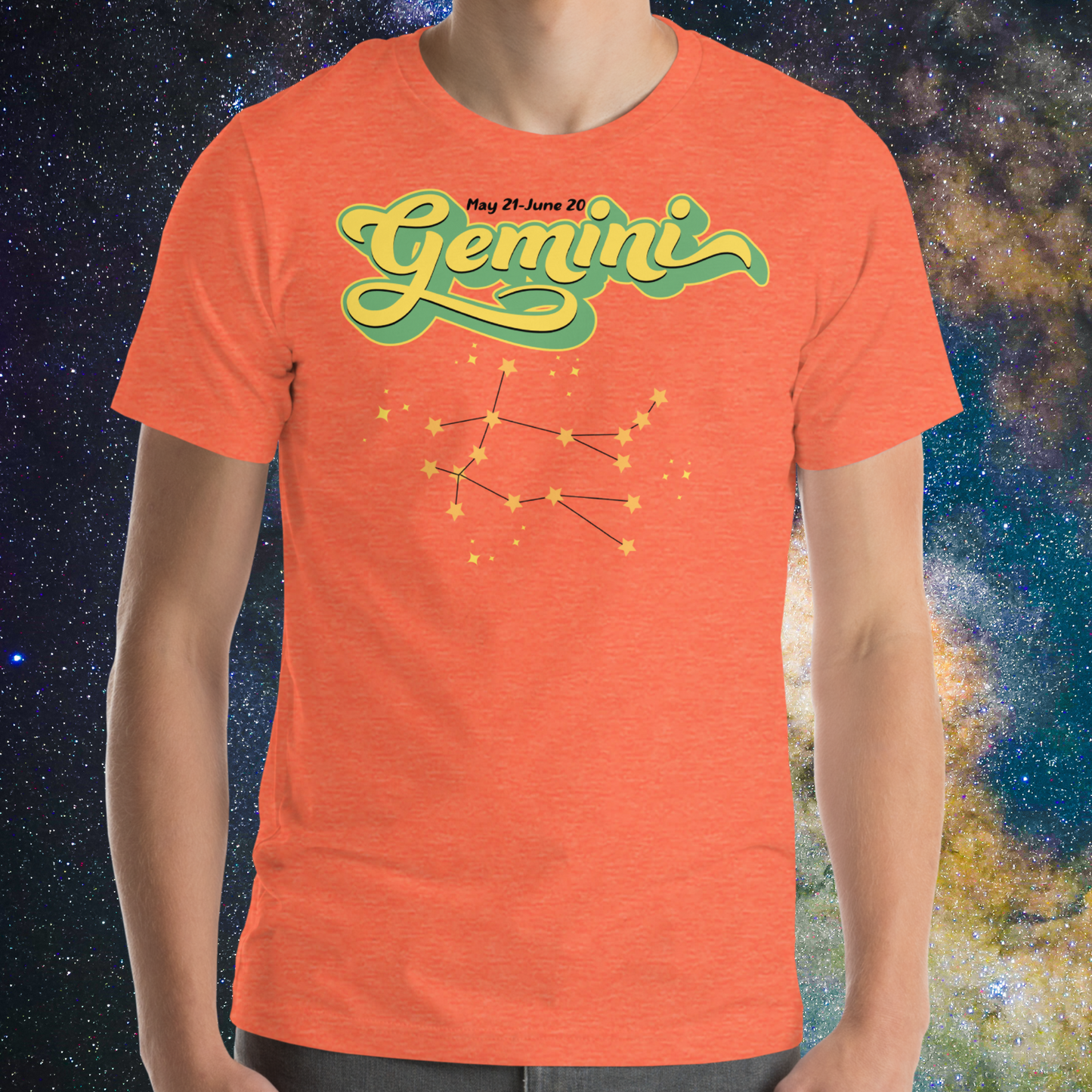 Front view of model wearing heather orange men's Gemini Tee. This Astrology T-Shirt has the word Gemini in large lemon yellow script shadowed in bright green for a 3-D effect. Above this it Says May 21-June 20. Under Gemini is the star constellation with yellow stars connected by a black line and yellow smaller stars surrounding this. The perfect May or June Birthday Gift for him or yourself.