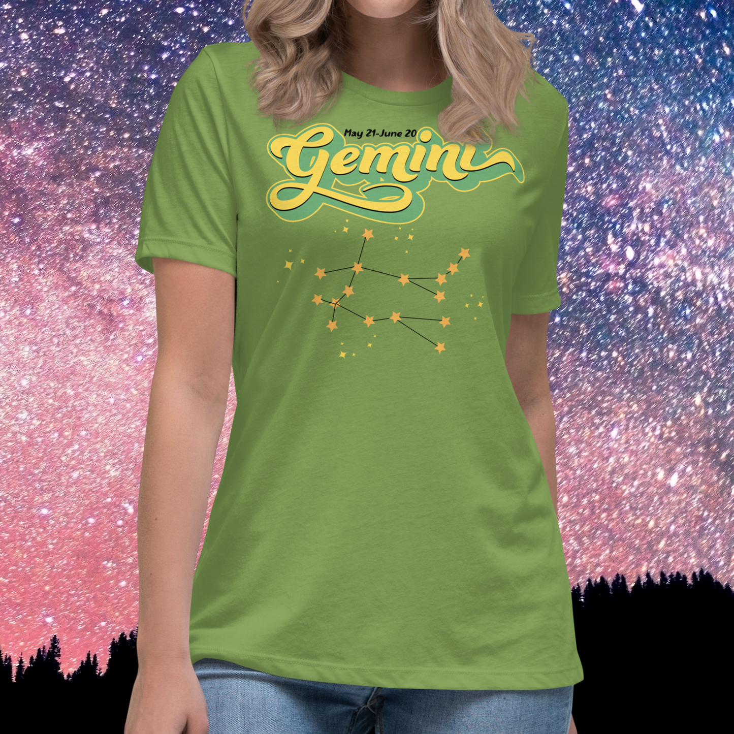 Front view of model wearing leaf green women's Gemini Tee. This Astrology T-Shirt has the word Gemini in large lemon yellow script shadowed in bright green for a 3-D effect. Above this it Says May 21-June 20. Under Gemini is the star constellation with yellow stars connected by a black line and yellow smaller stars surrounding this. The perfect May or June Birthday Gift for Her or yourself.