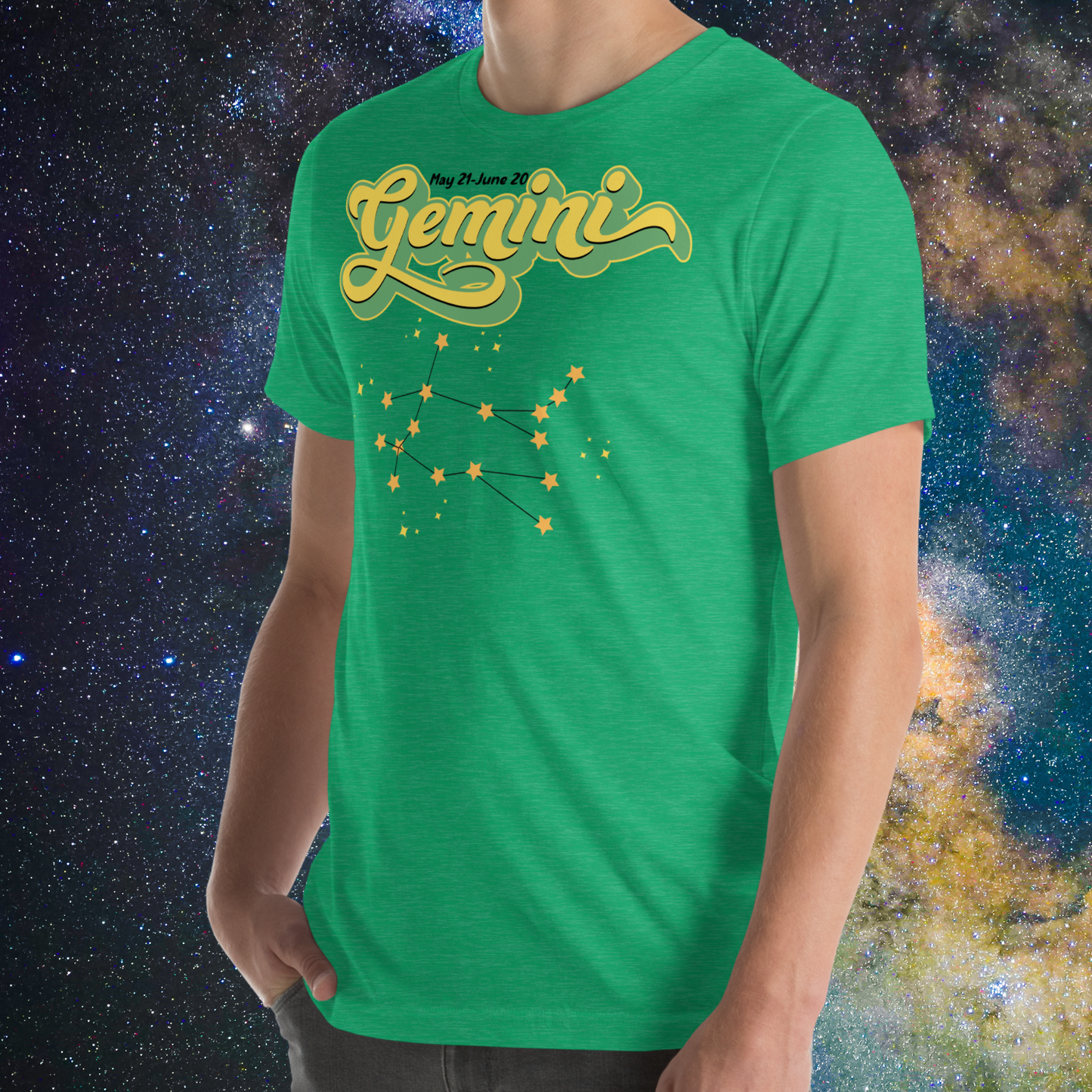 Front left view of model wearing heather kelly green men's Gemini Tee. This Astrology T-Shirt has the word Gemini in large lemon yellow script shadowed in bright green for a 3-D effect. Above this it Says May 21-June 20. Under Gemini is the star constellation with yellow stars connected by a black line and yellow smaller stars surrounding this. The perfect May or June Birthday Gift for him or yourself.