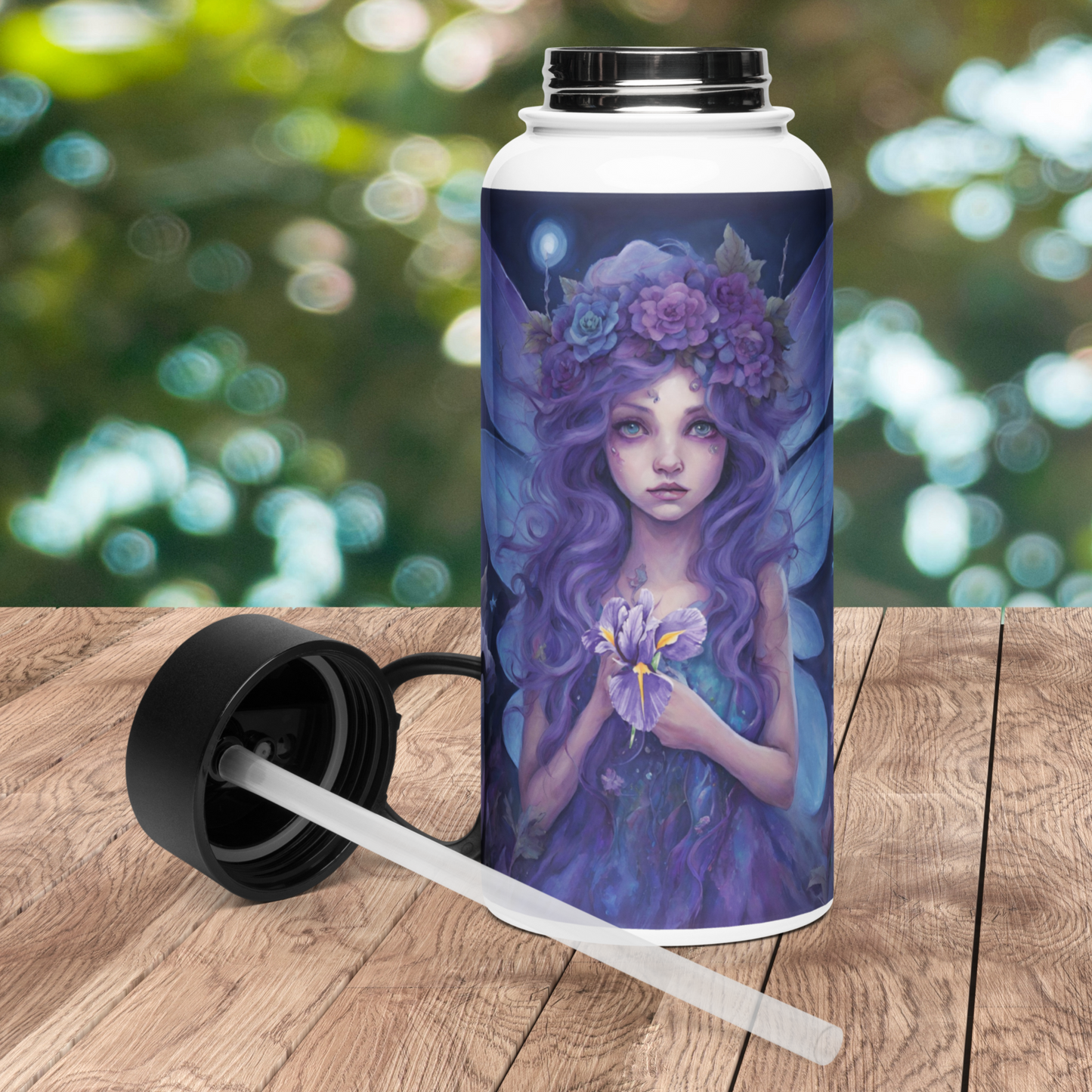 Front view of stainless steel bottle with lid off on the table next to the bottle on the left side. You can see the plastic straw inserted into the bottom of the lid.