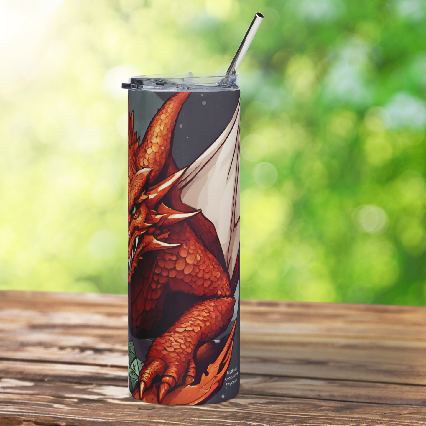 Red D20 Dragon Stainless Steel 20 oz Tumbler. View of the right side metal straw can be seen at the top of the tumbler. The right wing continues to wrap around the side. Red horns, spikes, a scaley foot, teeth, and a green eye are visible over a pile of green dice. Role Playing Games Tumbler