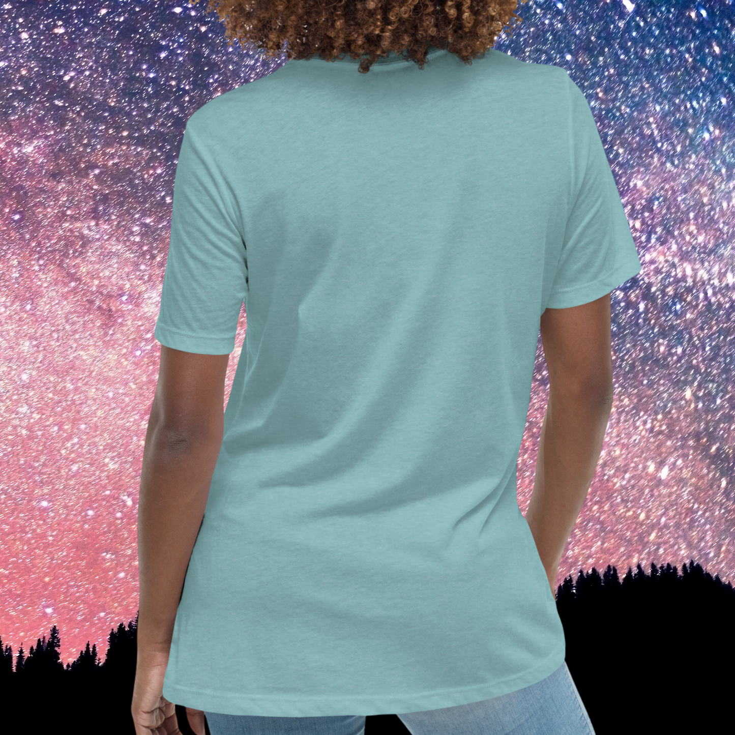Back view of model wearing heather blue lagoon women's Taurus Tee. Crew neck neckline and short sleeves going to mid upper arm, hem falls below hip. Back does not have a design. The perfect April or May Birthday Gift for Her or yourself.