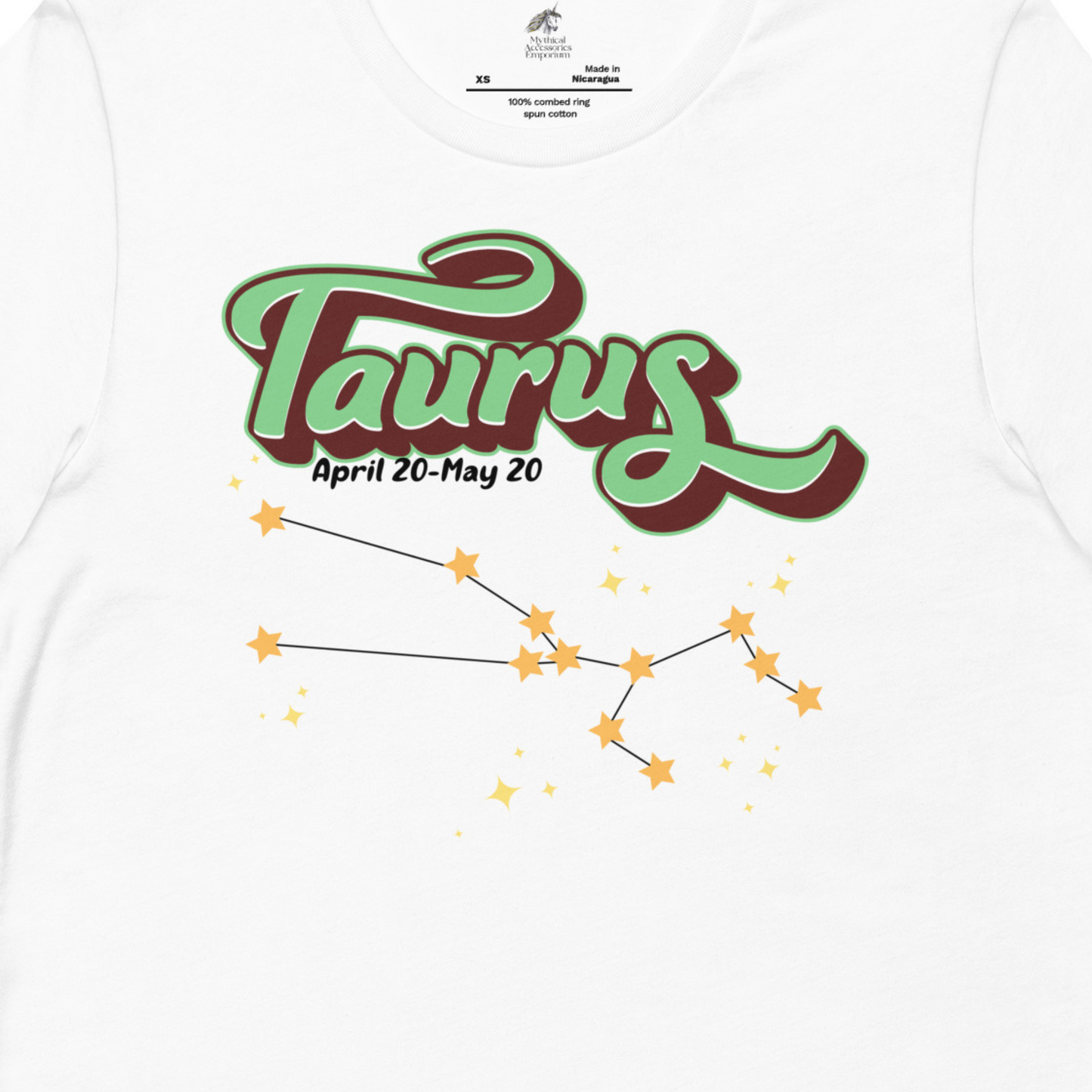 Up close front view of model wearing white men's Taurus Tee. This Astrology T-Shirt has the word Taurus in large leaf green script shadowed in deep brown for a 3-D effect. Below this it Says April 20-May 20. At the bottom is the star constellation for Taurus with yellow stars connected by a black line and smaller stars surrounding the constellation. The perfect April or May Birthday Gift for him or yourself.