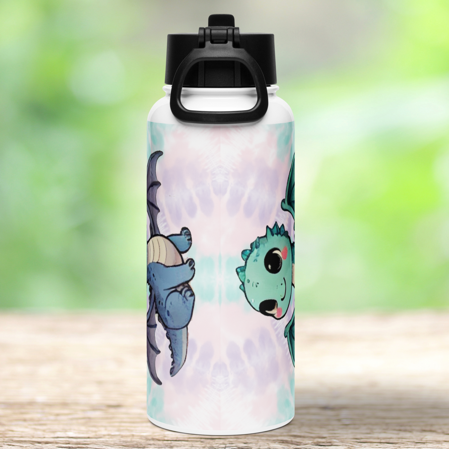 Back view of the dragon water bottle with black lid. Handle is down against the lid and bottle. You can see the top of the green dragon's head and the legs of the blue dragon. Purple, blue, pink tie dye background.