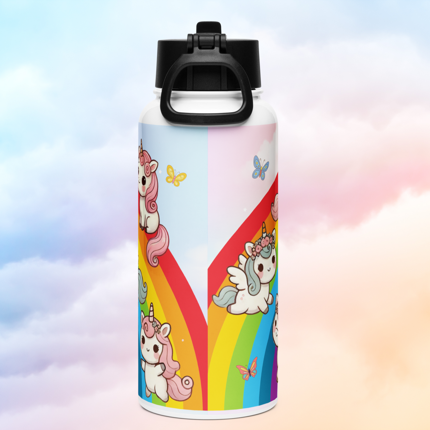 Back view of 32 oz tumbler with black lid. The handle of the lid is folded down. Here you can see both sides of the rainbow come together in the back. To the right you can see the winged unicorn with blue hair and pink flowers. To the left is a pink haired unicorn sitting, and a unicorn with curly pink hair standing up.