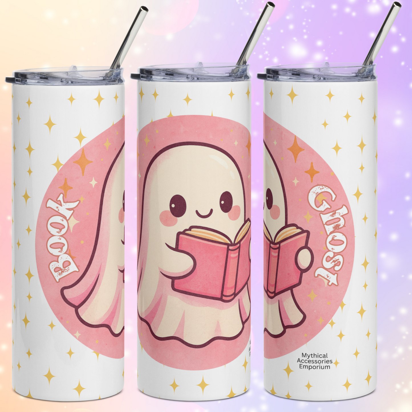 Pink Coquette Book Ghost Stainless Steel Tumbler on White Background. View of the left, front, and right side tumblers. Bubblegum pink circle with white ghost with pink shadows and rosy cheeks. The ghost is holding a pink book that is open and is reading. In white text to the left Book and to the right Ghost. There are yellow stars in the background on the white. You can see the edges of the lid on the tumbler and the metal straw sticking out of the top.