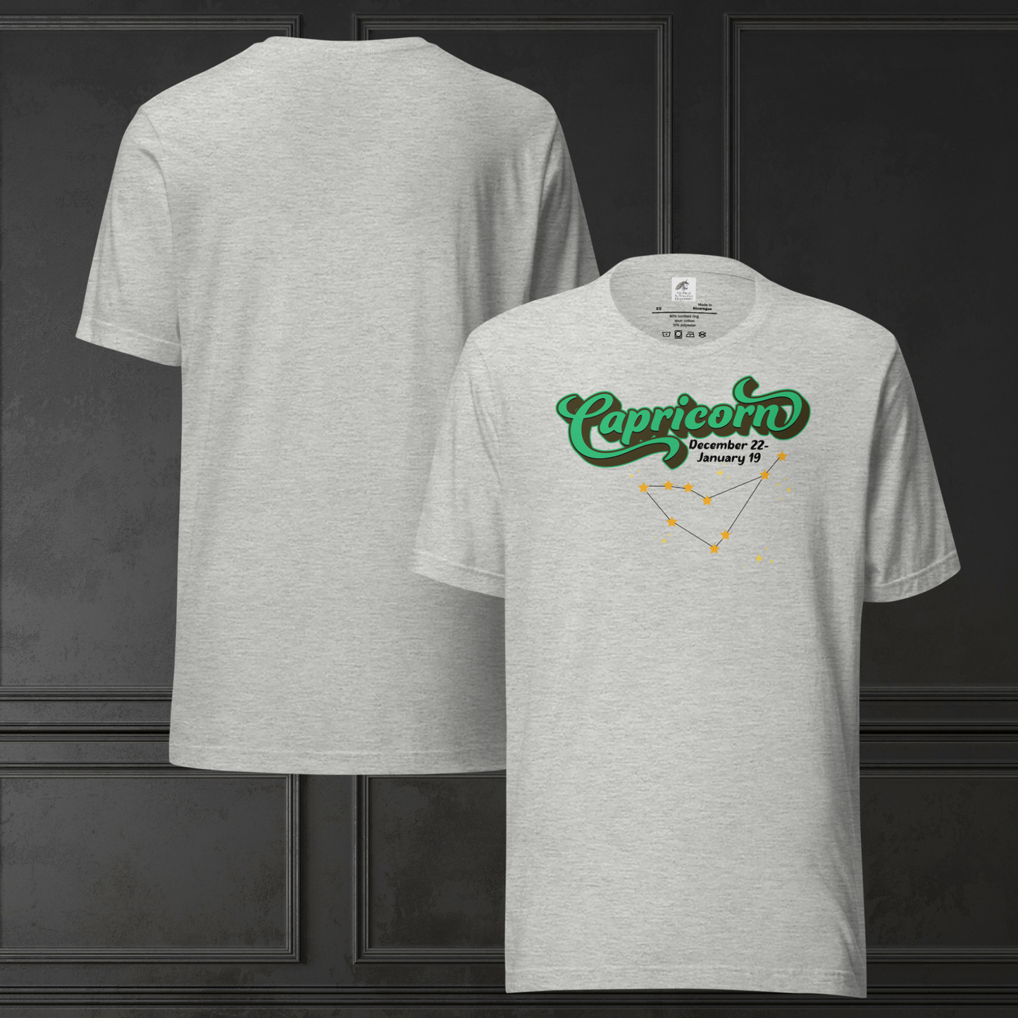 Front and back view of flat athletic heather men's Capricorn Tee. This astrology T-Shirt has the word Capricorn in large bright green script shadowed in deep brown almost black for a 3-D effect. Below this it Says December 22-January 19. Under Capricorn is the zodiac star constellation with yellow stars connected by a black line and lighter yellow smaller stars surrounding this. The perfect December or January Birthday Gift for him or yourself.