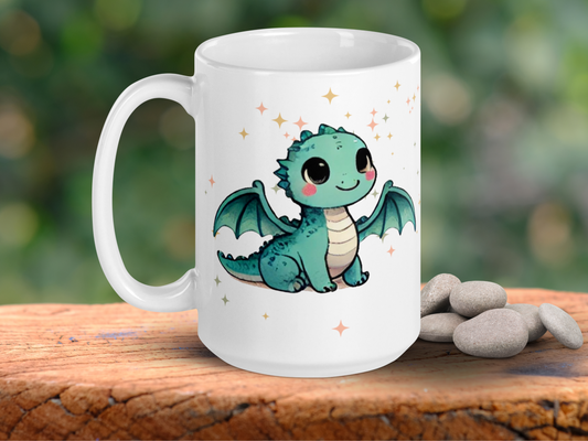 Dragon Mug, ceramic 15 oz coffee cup. Handle is to the left. Light green Kawaii Chibi Dragon with large eyes and rosy cheeks. Wings are extended and the dragon is looking up. surrounded by gold , silver, and rose gold stars.