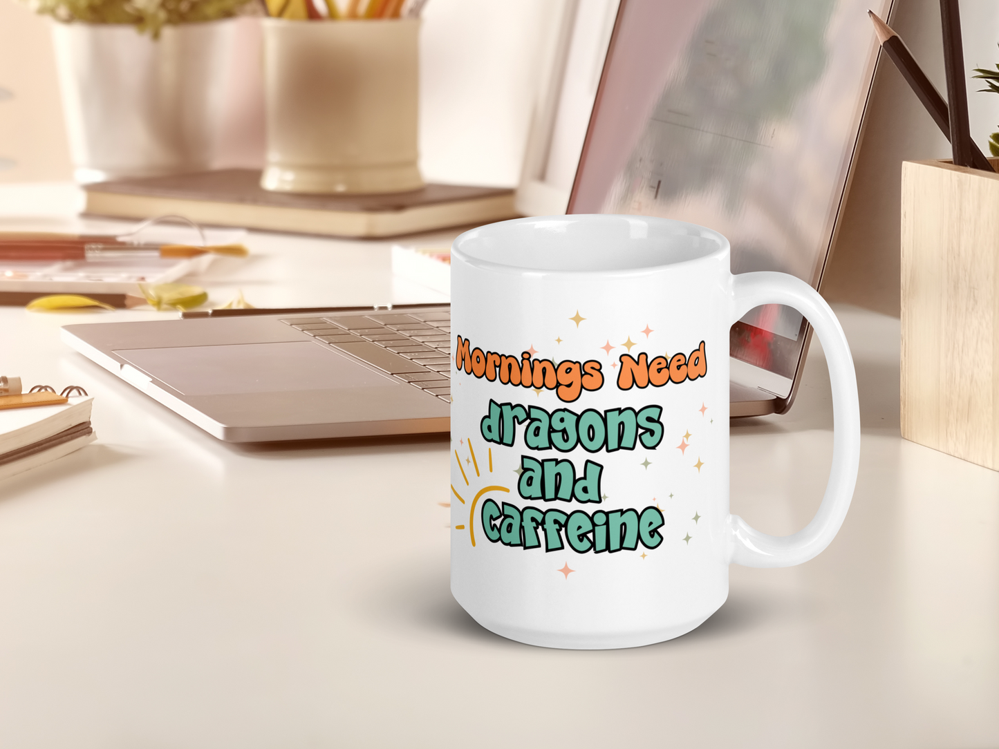 Dragon Mug Mornings need dragons and caffeine sitting on a computer desk next to a laptop.