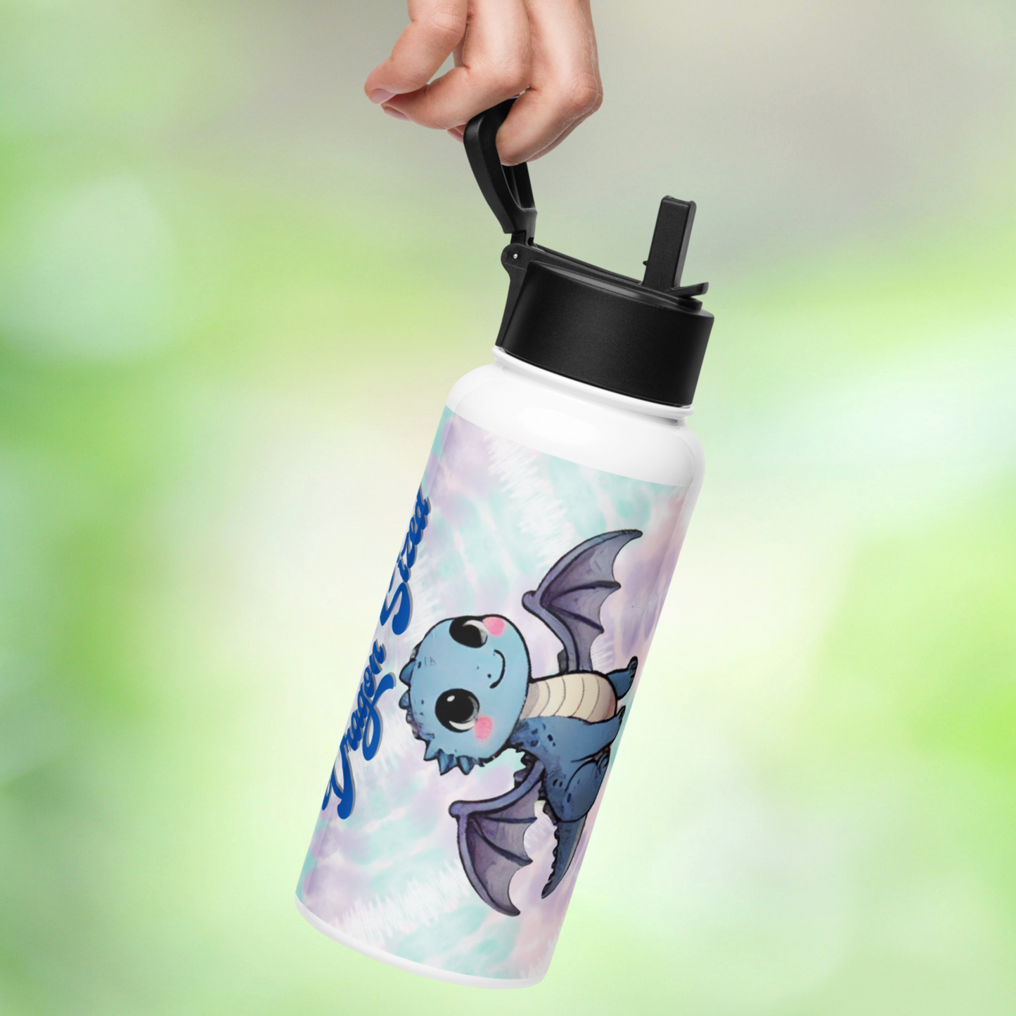 Everyday Magic Dragon Sized Tumbler hanging by handle from a hand.