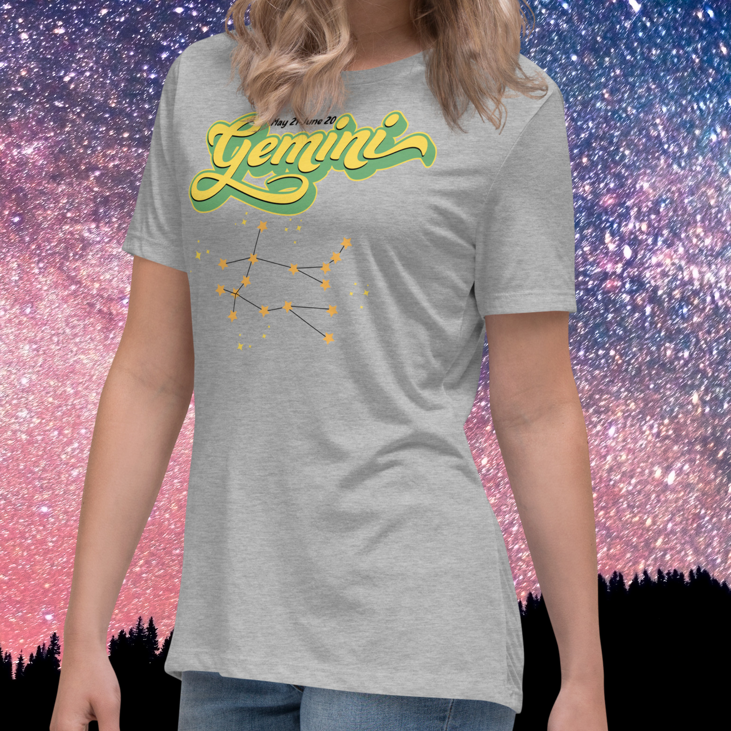 Front right view of model wearing athletic heather grey women's Gemini Tee. This Astrology T-Shirt has the word Gemini in large lemon yellow script shadowed in bright green for a 3-D effect. Above this it Says May 21-June 20. Under Gemini is the star constellation with yellow stars connected by a black line and yellow smaller stars surrounding this. The perfect May or June Birthday Gift for Her or yourself.