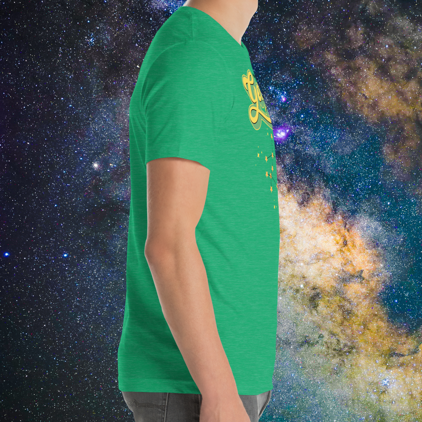 Right side view of model wearing heather kelly green men's Gemini Tee. This Astrology T-Shirt view shows the crew neckline, short sleeves end at mid upper arm, and hem ends right below hip on the model. The perfect May or June Birthday Gift for him or yourself.