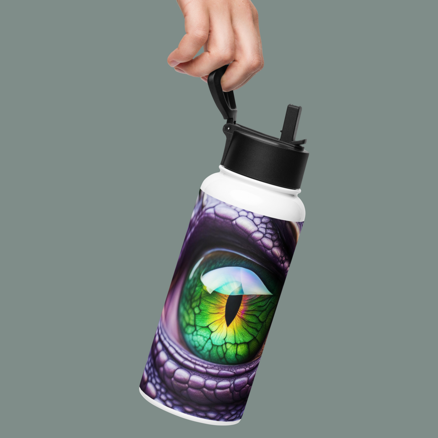 Stainless Steel Water Bottle hanging from a hand by the handle. Flip up straw is up from the black lid. Bottle has a purple scaled dragon with a emerald green eye.