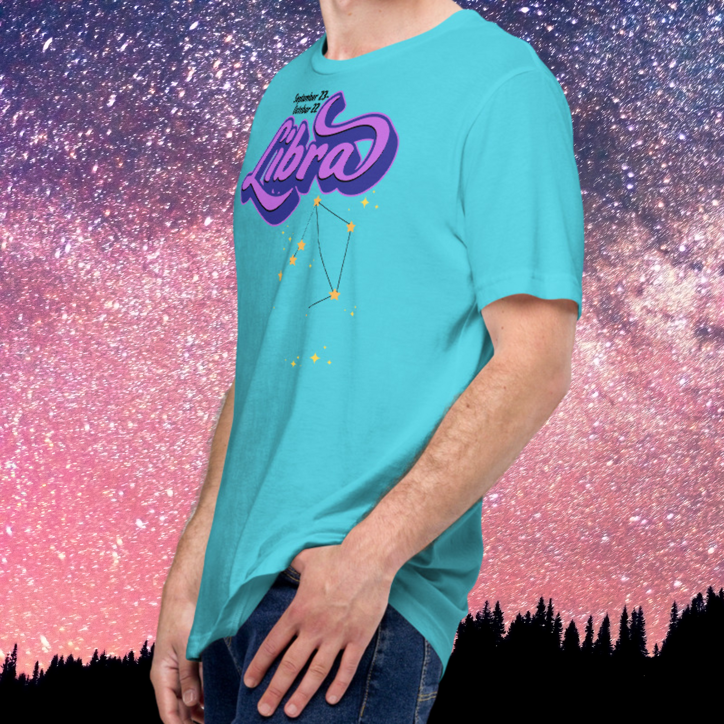 left front view of model wearing turquoise men's Libra Tee. This astrology Libra T-Shirt has the word Libra in large purple script shadowed in deep blue for a 3-D effect. Below this it Says September 23-October 22. Under Libra is the zodiac star constellation with yellow stars connected by a black line and lighter yellow smaller stars surrounding this. The perfect October or September Birthday Gift for him or yourself.