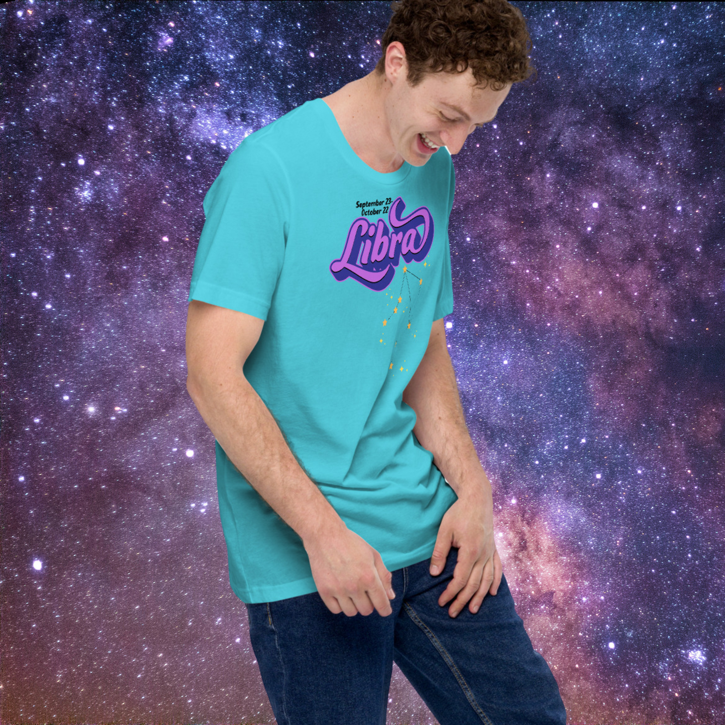 Right front view of model wearing turquoise men's Libra Tee. This astrology Libra T-Shirt has the word Libra in large purple script shadowed in deep blue for a 3-D effect. Below this it Says September 23-October 22. Under Libra is the zodiac star constellation with yellow stars connected by a black line and lighter yellow smaller stars surrounding this. The perfect October or September Birthday Gift for him or yourself.