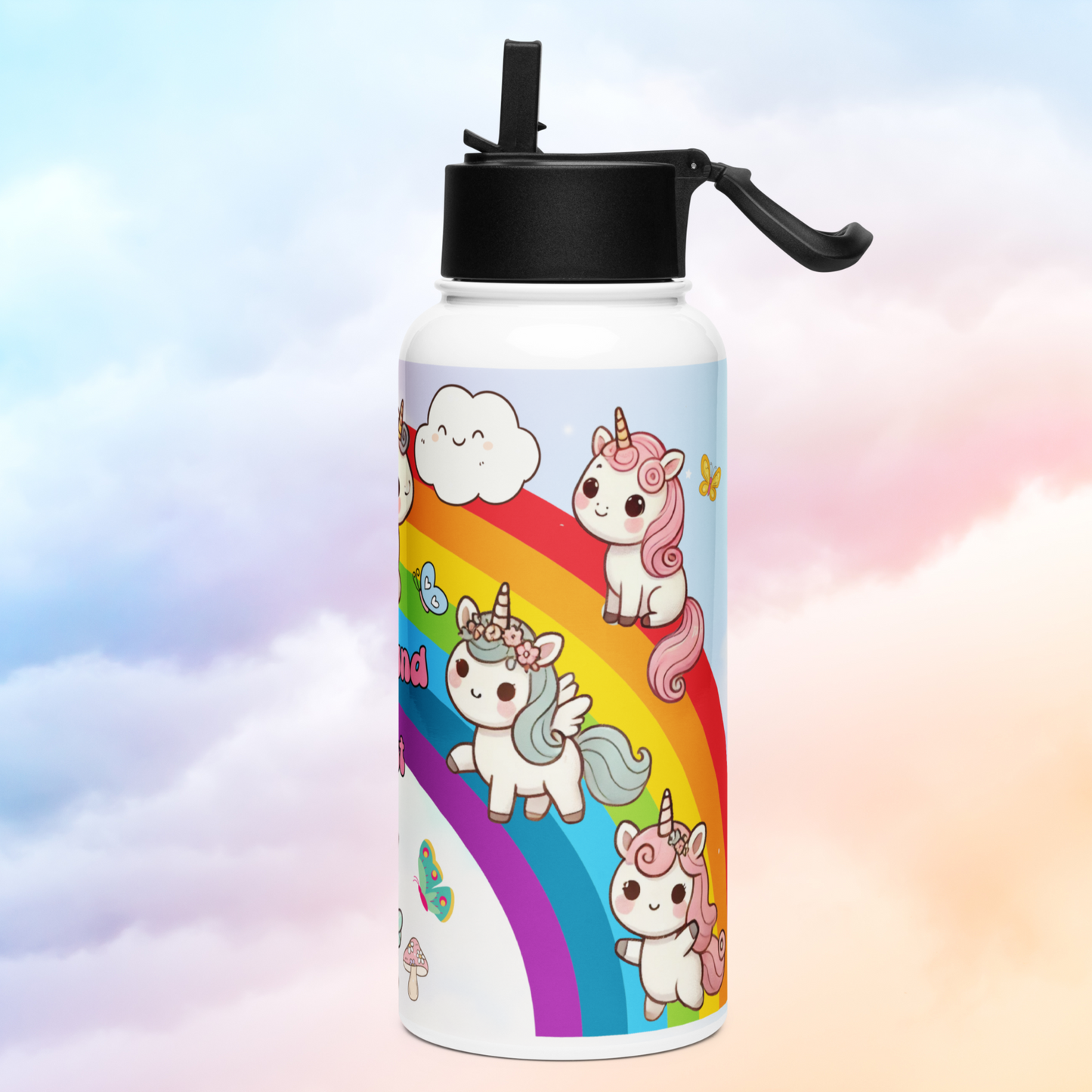 Right side view of rainbow on 32 oz stainless steel tumbler with happy faced cloud. Unicorn with pink curly hair sitting at the top side. Winged unicorn with blue hair and pink flowers walking in the middle. Unicorn with pink hair and flowers standing up at the bottom. Black lid with straw flipped up and handle to the right.