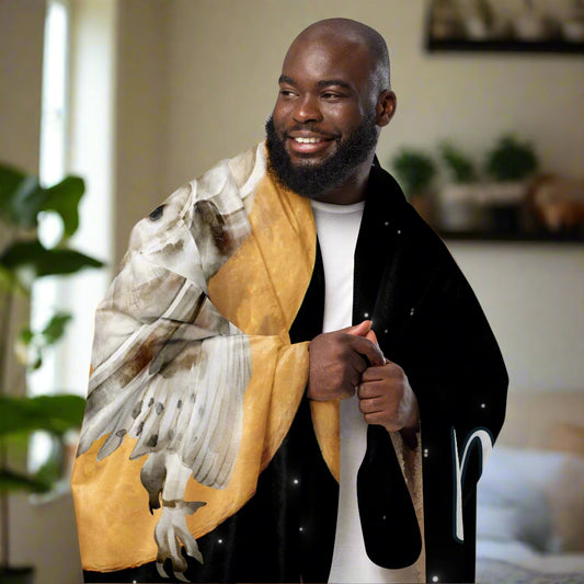 My spirit animal owl throw blanket. Man with Fantasy Owl Blanket over shi shoulders. On a black background with stars a white owl flies across a harvest moon, My Spirit Animal in white on the lower left. mythical accessories emporium. Fantasy Home Decor, Celtic Mythology, Athena Blanket, Nature Inspired Book Lovers Gift