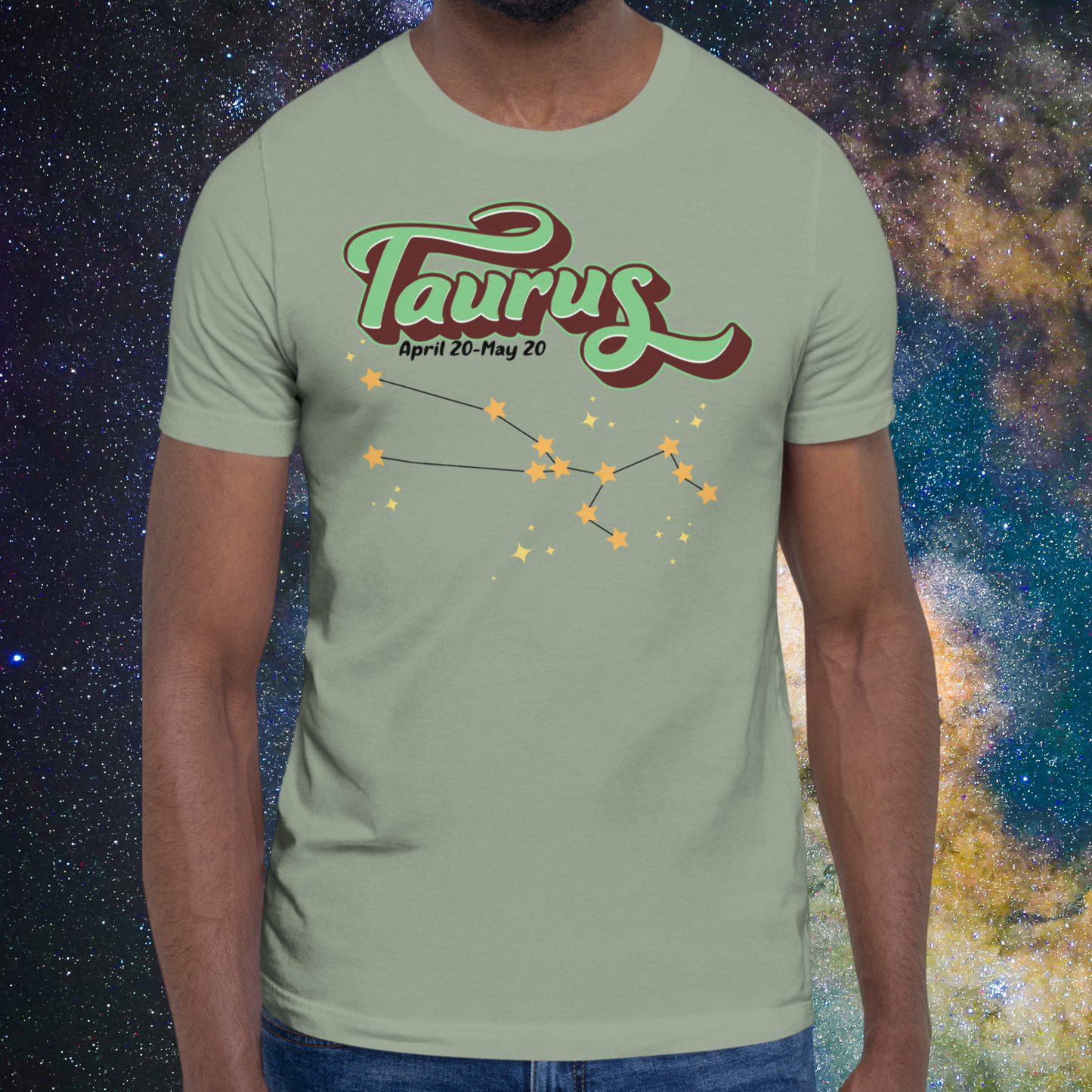 Front view of model wearing sage men's Taurus Tee. This Astrology T-Shirt has the word Taurus in large leaf green script shadowed in deep brown for a 3-D effect. Below this it Says April 20-May 20. At the bottom is the star constellation for Taurus with yellow stars connected by a black line and smaller stars surrounding the constellation. The perfect April or May Birthday Gift for him or yourself.