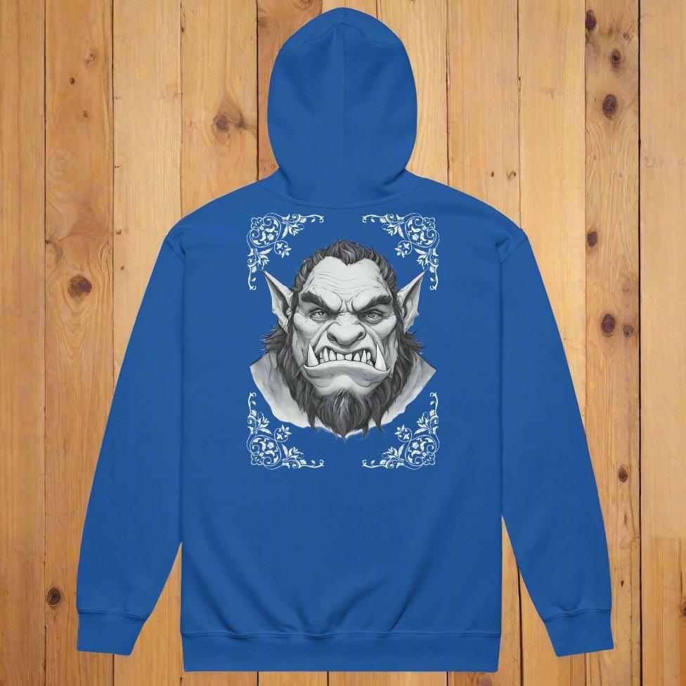 Orc Men's zip up hoodie, royal (blue), back view, flat lay on counter. Flower corner borders in dark grey green frame a monochrome image of a fierce Orc. Bearded, tusk like teeth, and pointed ears