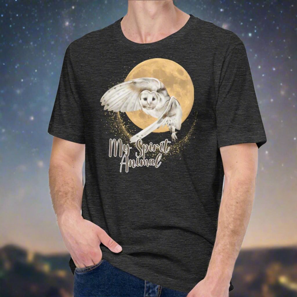 My spirit animal owl men's graphic tee, dark grey heather shirt front view, white owl flying against a harvest moon wings sparking a gold magical halo, mythical accessories emporium