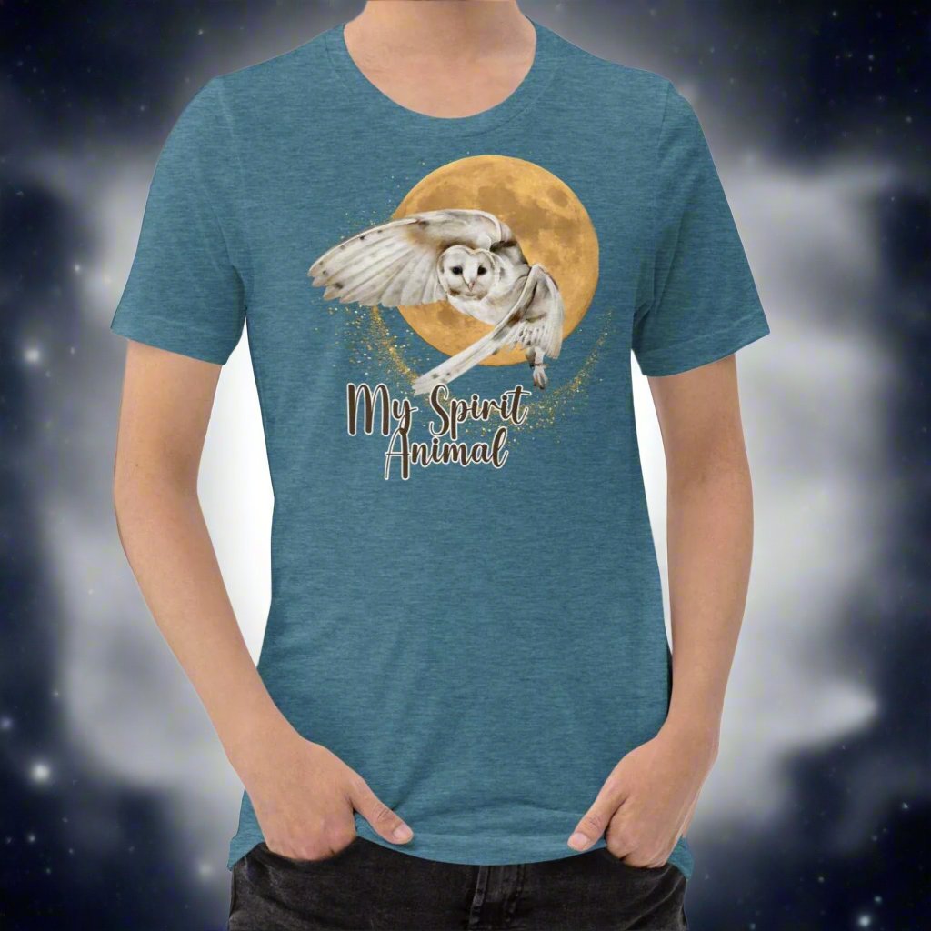 My spirit animal owl men's graphic tee, heather deep teal shirt front view, white owl flying against a harvest moon wings sparking a gold magical halo, mythical accessories emporium