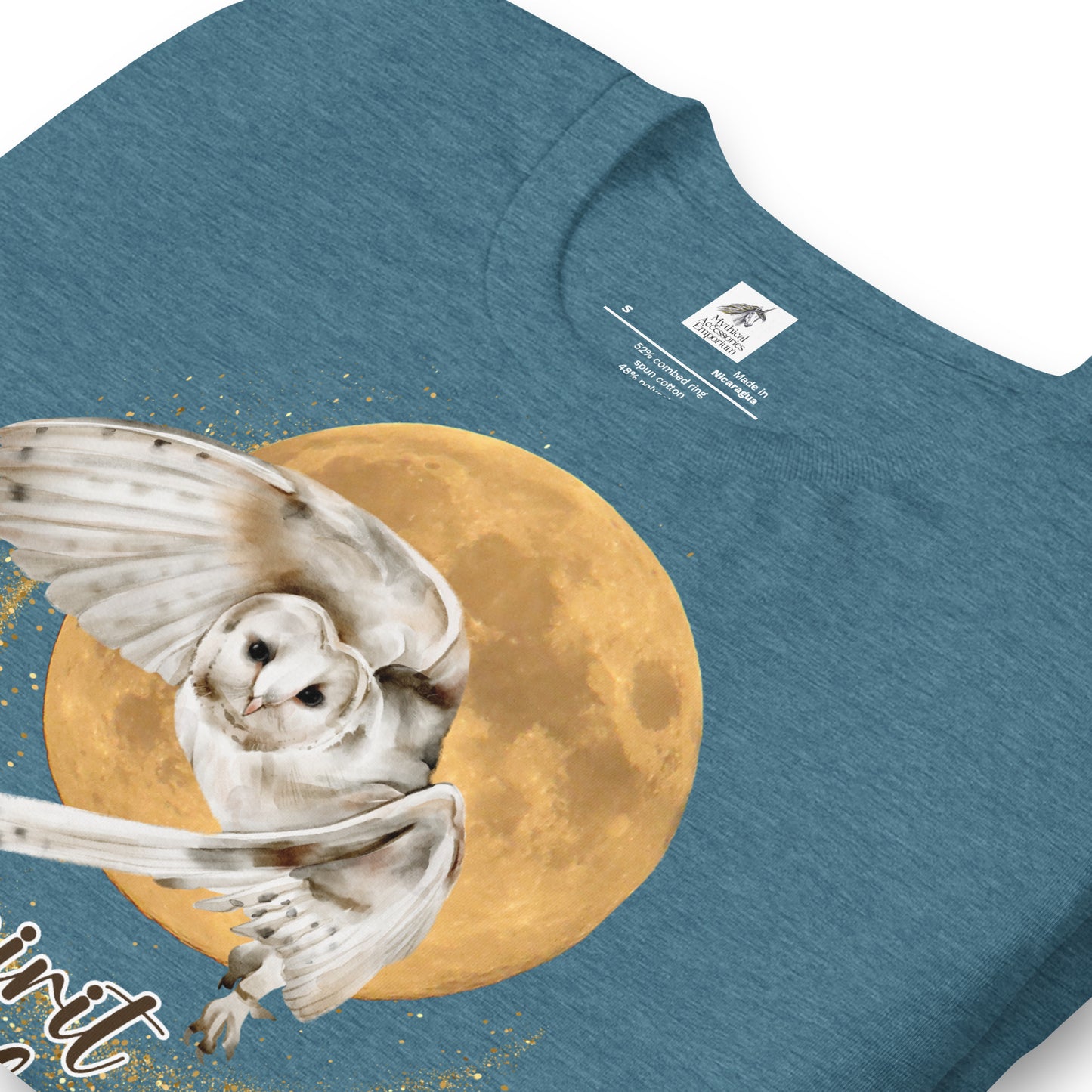 My spirit animal owl men's graphic tee, heather deep teal shirt front folded view, white owl flying against a harvest moon wings sparking a gold magical halo, mythical accessories emporium
