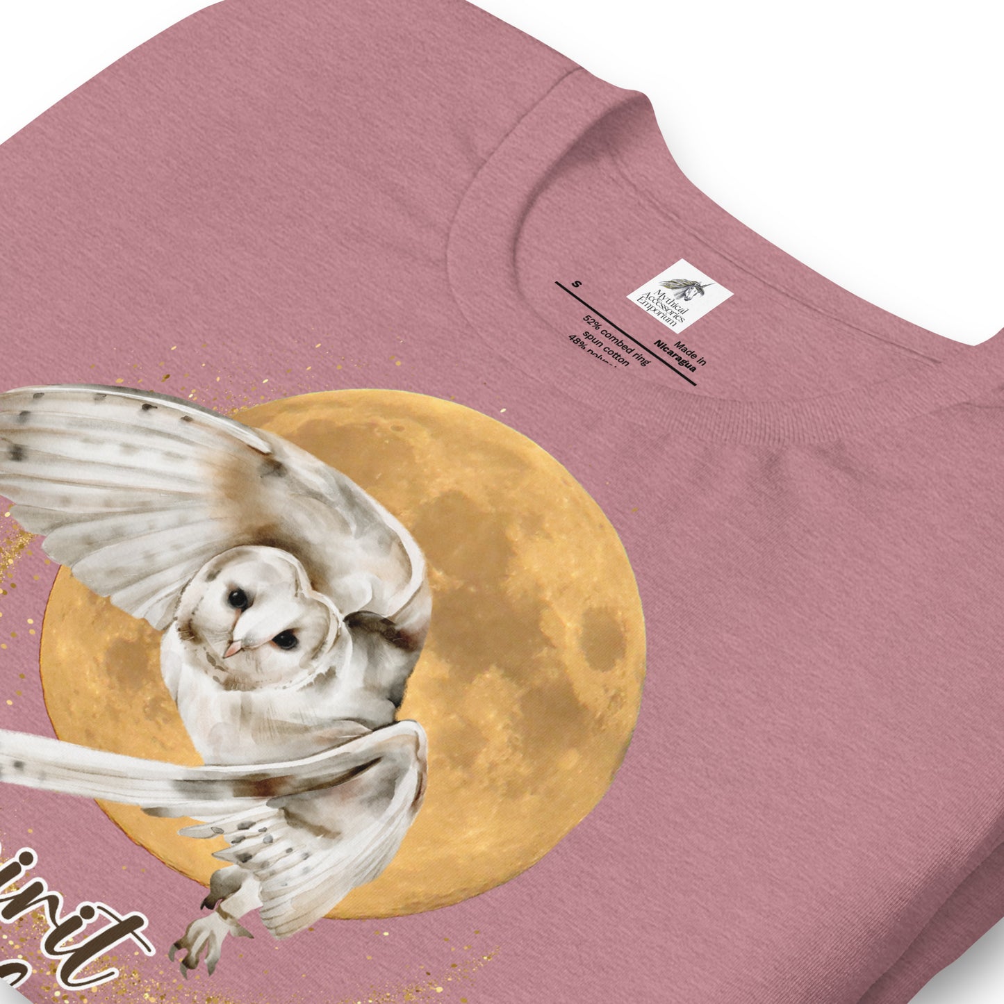 My spirit animal owl men's graphic tee, heather orchid shirt folded front view, white owl flying against a harvest moon wings sparking a gold magical halo, mythical accessories emporium