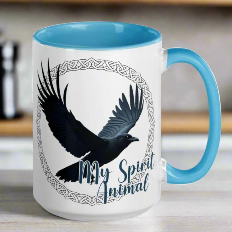 My Spirit Animal Raven Crow Coffee Tea Mug, Front View handle to right blue interior and handle, Raven wings spread in a Celtic Knot circle above My Spirit Animal, Mythical Accessories Emporium