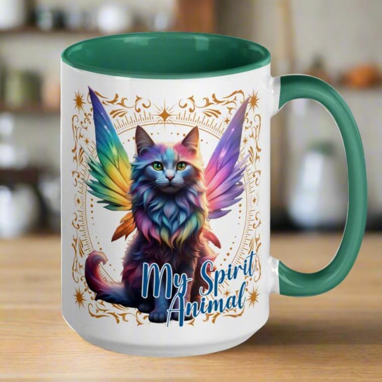 My Spirit Animal Fairy Cat ceramic mug. handle to the right white mug with green interior and handle, Rainbow Fae Cat wings spread out. Gold frame of magic symbols surround the fae cat. My Spirit Animal under the fairy cat in blue