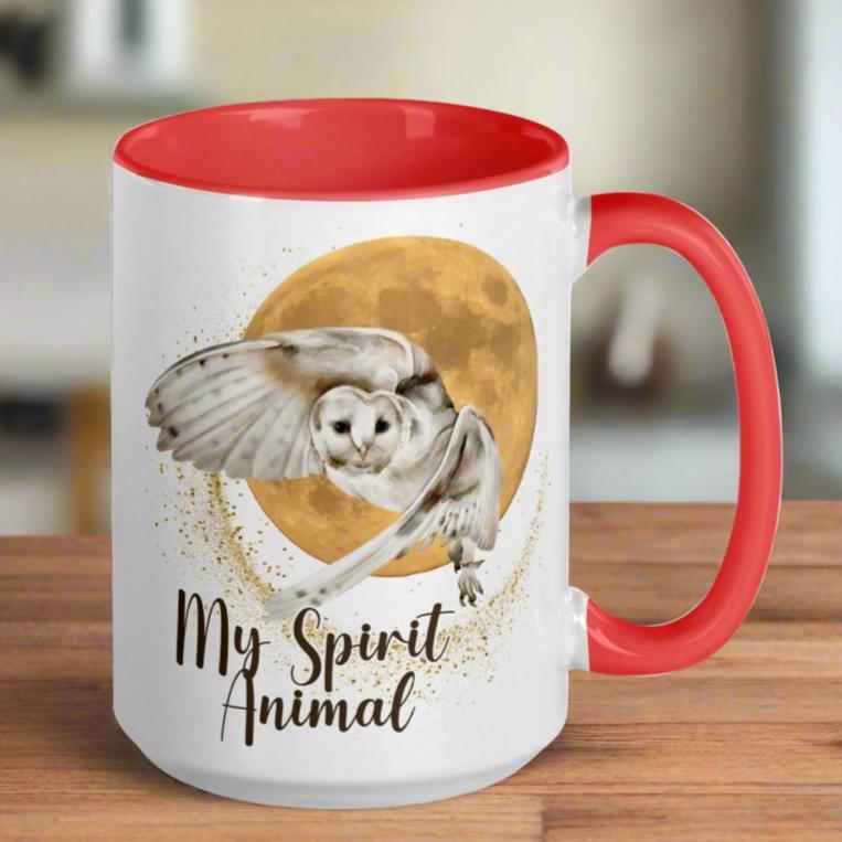 My spirit animal owl coffee mug, red interior and handle, handle to the right, white owl flying against a harvest moon wings sparking a gold magical halo, mythical accessories emporium