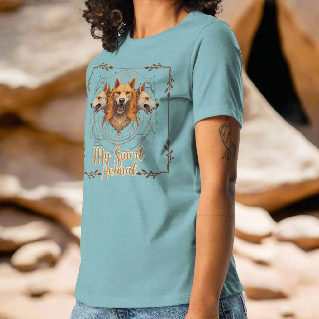 My Spirit Animal Cerberus Women's Graphic Tee, front View heather blue lagoon t shirt. A three headed guardian of the underworld in golden browns with jaws open to display canines. Below the hellhound is my spirit animal