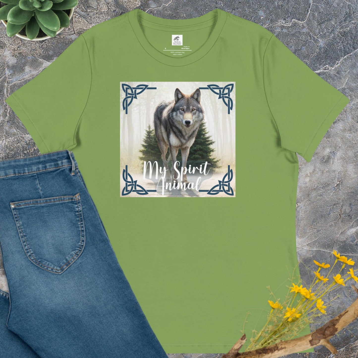 Wolf My Spirit Animal Women's T-Shirt. Front front view in Leaf (green). A grey wolf gazes at you from the forest bordered in Celtic knots. Timber Wolf Graphic Tee Shamanic Totem Animal, Mythical Accessories Emporium.