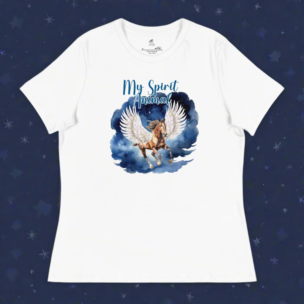 My Spirit Animal Women's Graphic Tee, Flat Front View of white tee, Pegasus white feathered wings on a Pinto with a dark brown mane and tail, galloping through the sky against a background of clouds and stars. Mythical Accessories