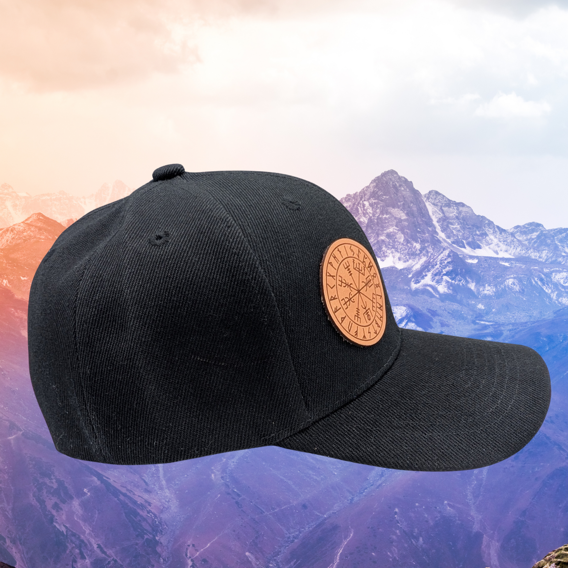 Viking Rune Wayfinder Vegvisir Snapback Hat. right side view of hat. On the right front of the hat is a round leather patch. On the leather patch is a laser engraved image of the viking compass also known as Wayfinder or Vegvisir. This is a rune of protection and not losing one's way.