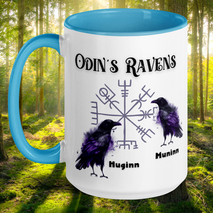 Odin's Ravens Mug, Viking Mug, Viking Gifts,Norse Pagan Gift, Norse Mythology Gift, White Ceramic Mug with blue interior, rim, and handle. Odin's Ravens Huginn and Muninn in purple and black in front of viking symbol vegvisir. Mythical Accessories Emporium