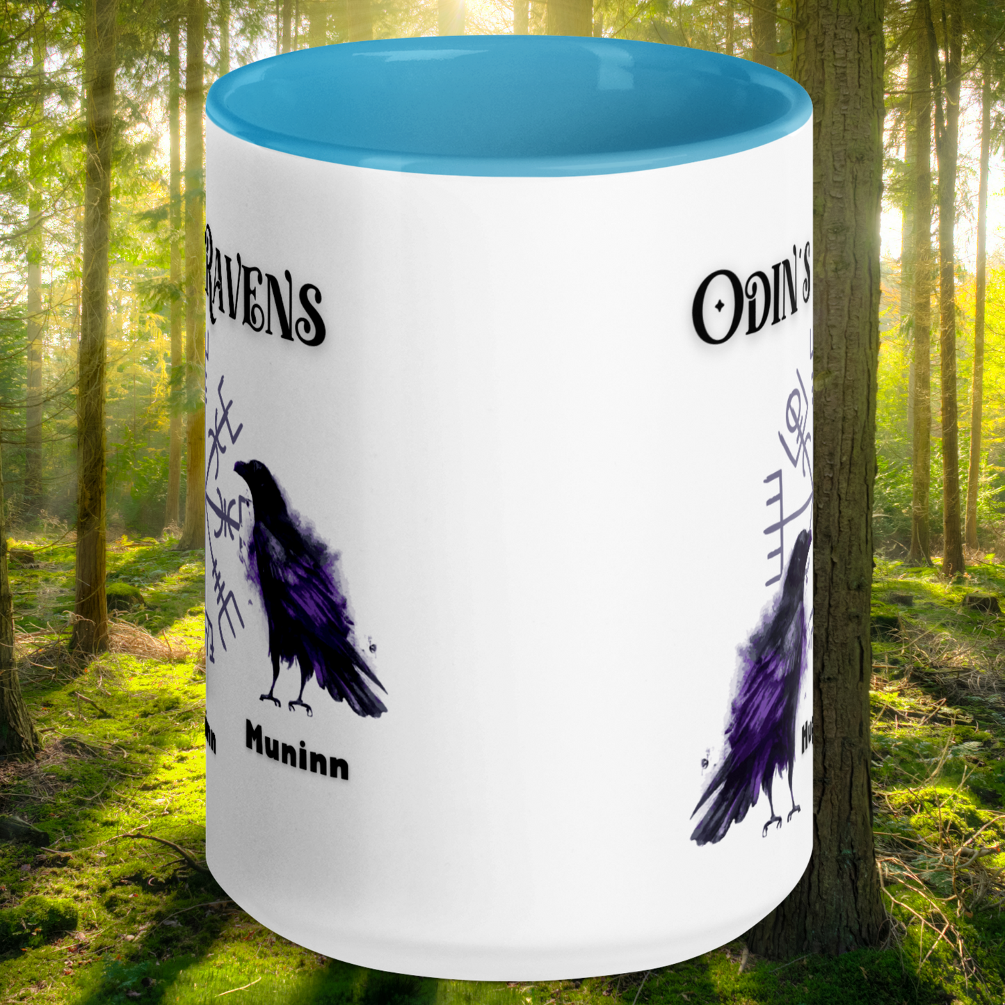 Odin's Ravens Mug, Viking Mug, Viking Gifts,Norse Pagan Gift, Norse Mythology Gift, White Ceramic Mug with blue interior, rim, and handle. Odin's Ravens Huginn and Muninn in purple and black in front of viking symbol vegvisir. Mythical Accessories Emporium