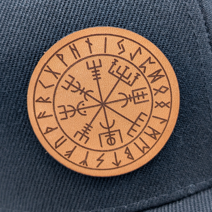 Up close view of the leather patch is a laser engraved image of the viking compass also known as Wayfinder or Vegvisir. This is a rune of protection and not losing one's way.