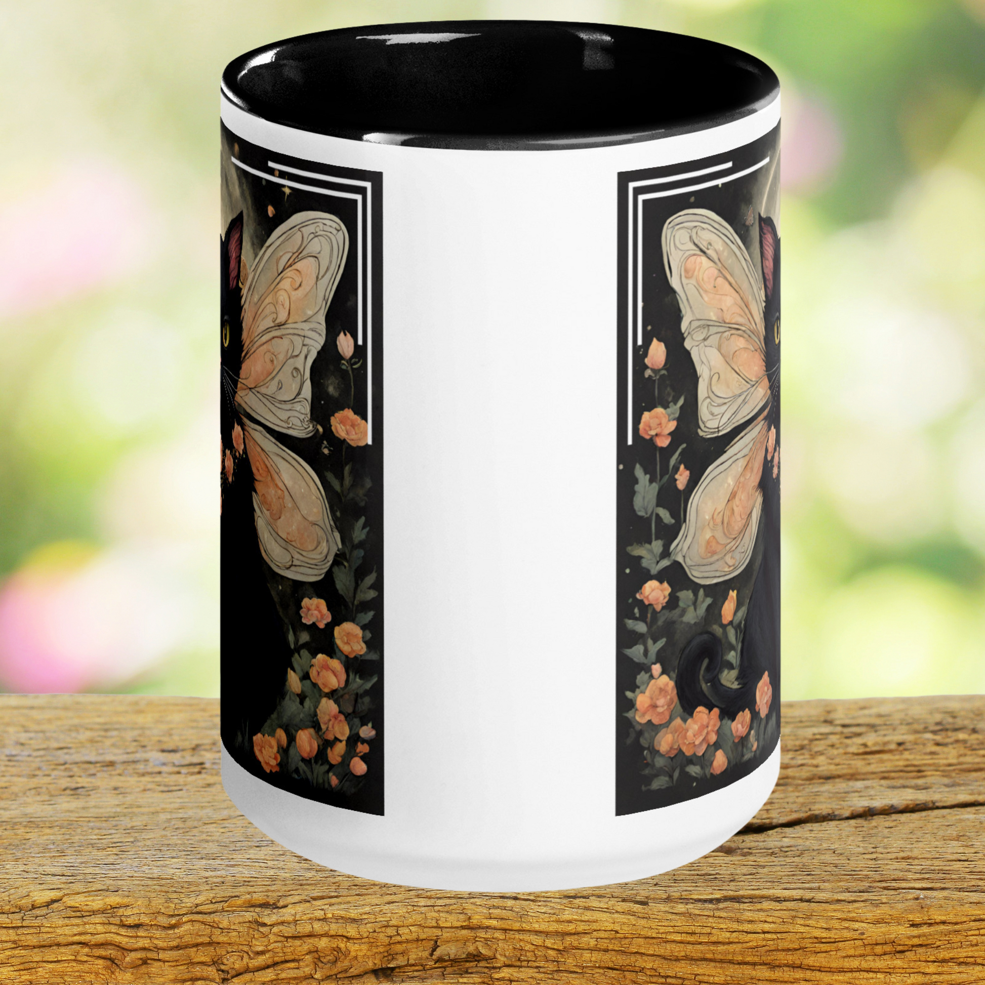 Front view of White ceramic mug with black interior and rim. You can see the white area between the two sides of the graphics. Mythical Accessories Emporium