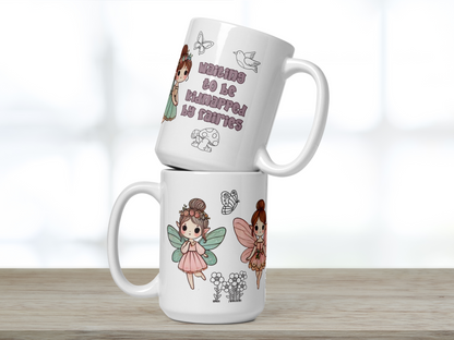 White  15 oz ceramic mug. Image shows two mugs stacked on top of each other handles to either direction. Top mug handle to right in dusky purple text says waiting to be kidnapped by fairies. Above is a butterfly and bird and below is a mushroom. You can see the side of a fairy. Bottom mug handle to the left. You see a walking fairy in a pink dress, blue wings, hair in a bun with flowers. You see the side of another fairy to the right with pink wings and dress. Between the fairies are flowers and a butterfly