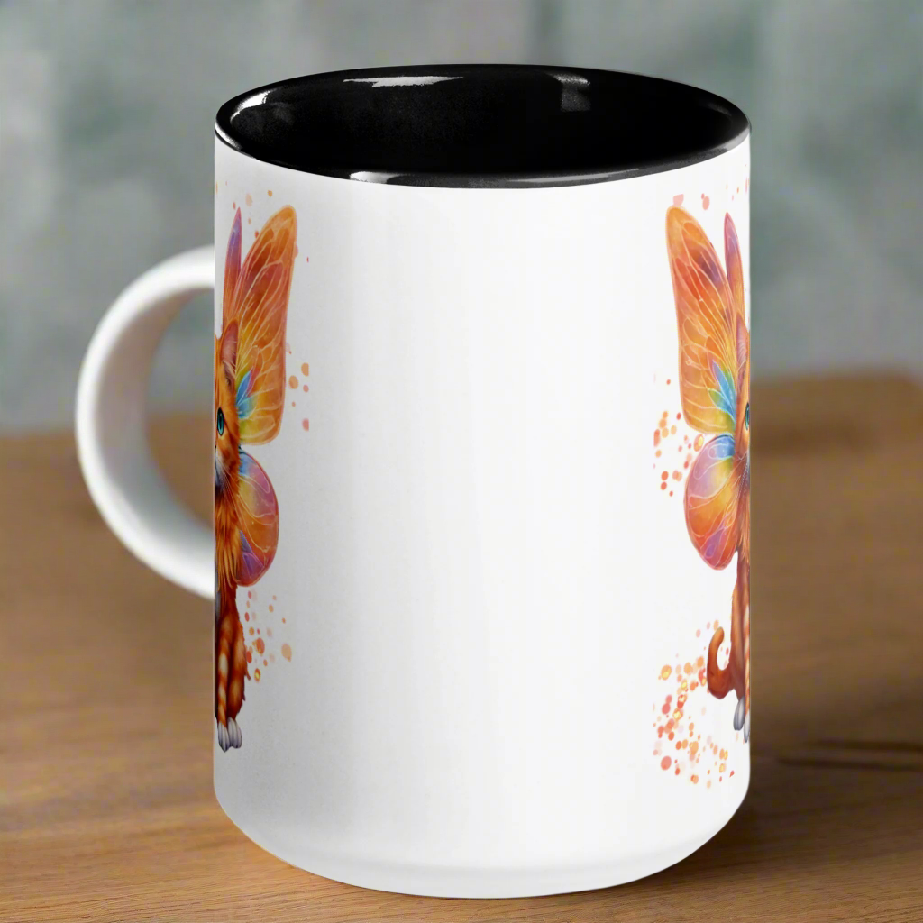 Ceramic Mug with black interior and handle, view is from the opposite side as the handle. Orange tabby striped Fairy Cat on both sides of Mug, Cat features orange wings with hints of blue and pink