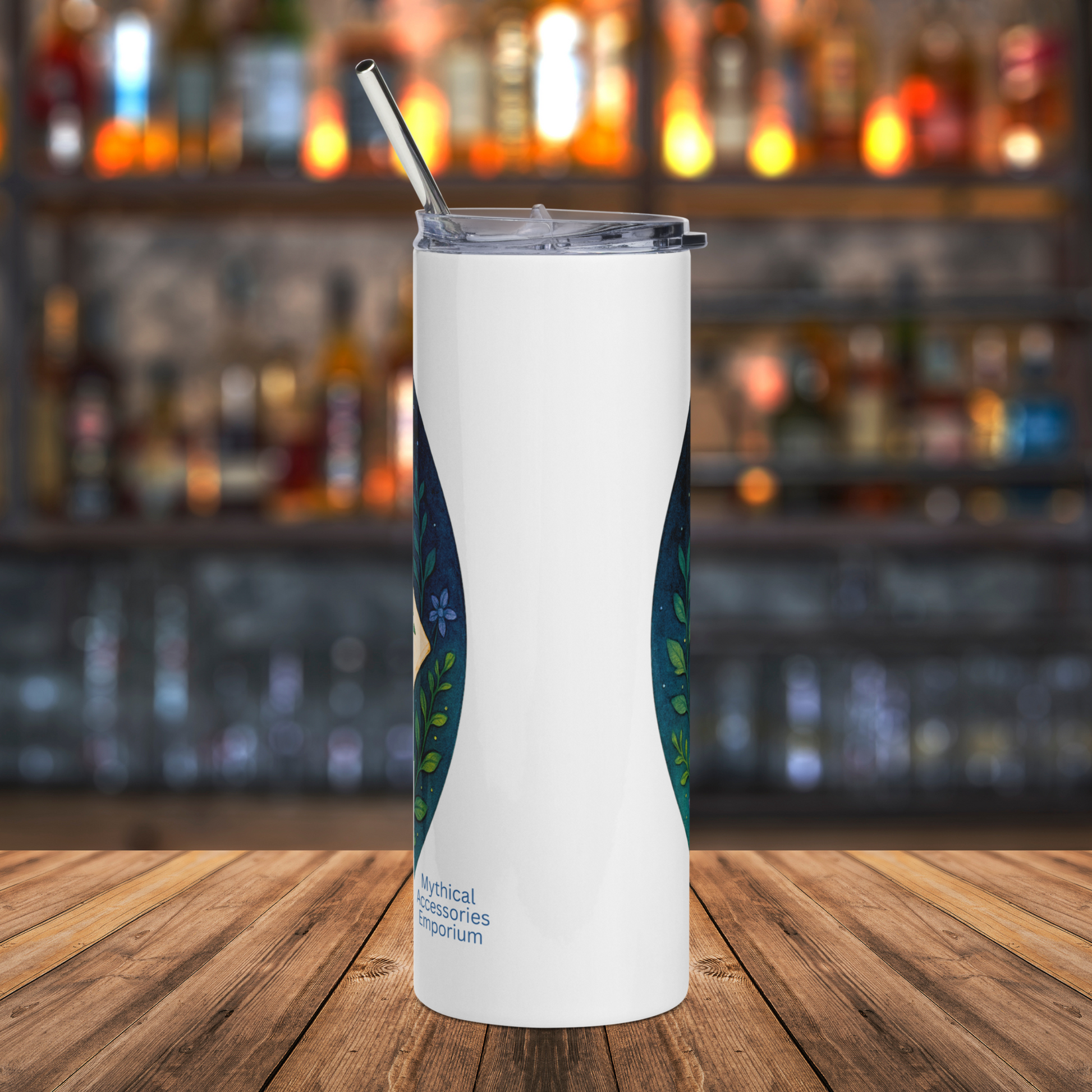 Drink Me 20 oz stainless steel tumbler back view. Metal straw is visible above the rim of the lid. White tumbler with vines visible on the left and right side.  Alice in Wonderland