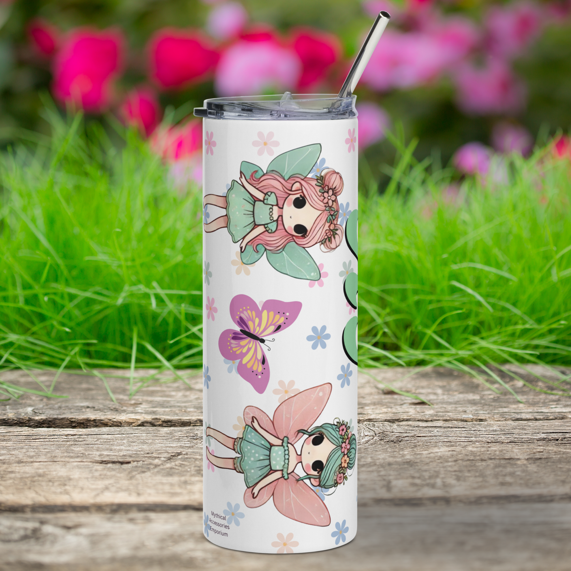 Enchanted AF Fairy Stainless Steel Tumbler right side view. Metal Straw is visible over the edges of the BPA plastic lid. Here you see two kawaii fairies with rosy cheeks and large black eyes. Each one has pink flowers in their hair. Fairy 1 has pink hair in double buns, blue dress, and blue butterfly wings. Fairy 2 has blue hair in a bun, blue dress, and pink butterfly wings. A purple butterfly and floral daisy background. Fantasy Book Lover's Gift