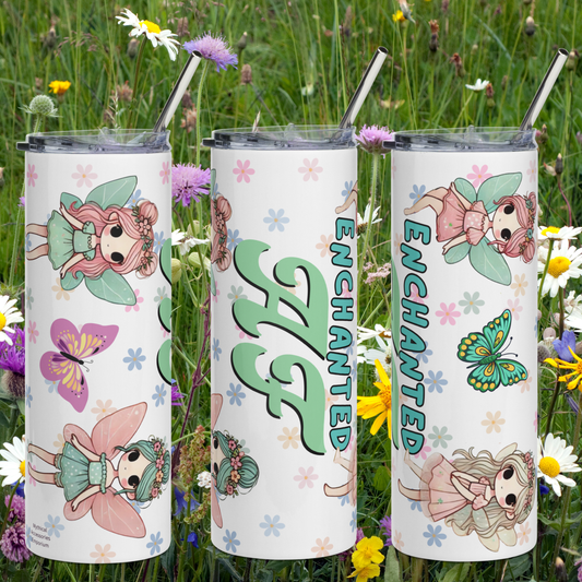 Enchanted AF Stainless Steel 20 oz Tumbler. Three Tumblers showing the left, front, and right side. BPA free plastic lid is on and you can see the metal straw sticking out above it. In blue print style text is the word Enchanted. Below that at about 3 times the width is the abbreviation AF in stylized Calligraphy. 4 Kawaii Fairies, two on each side, a floral background, and butterflies can be seen.